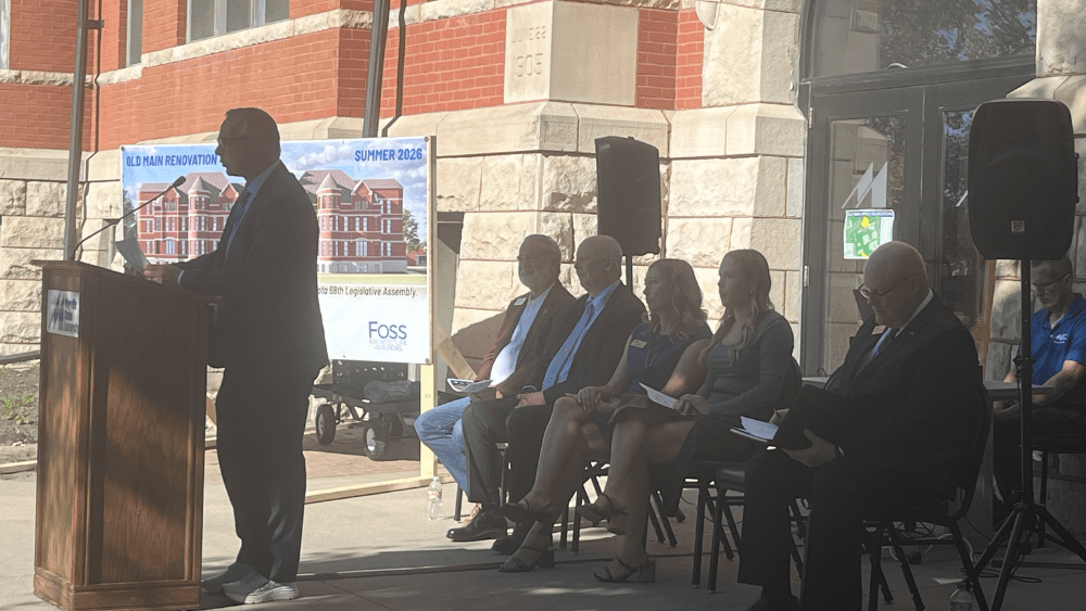 Mayville State University President Dr. Brian Van Horn^ far left^ speaks at the Old Main Renovation Celebration on Mayville State's camps / Photo by Chris Larson