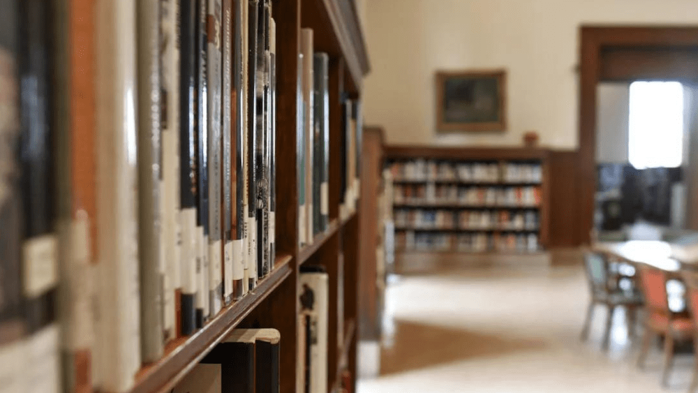 Books on a shelf in a library