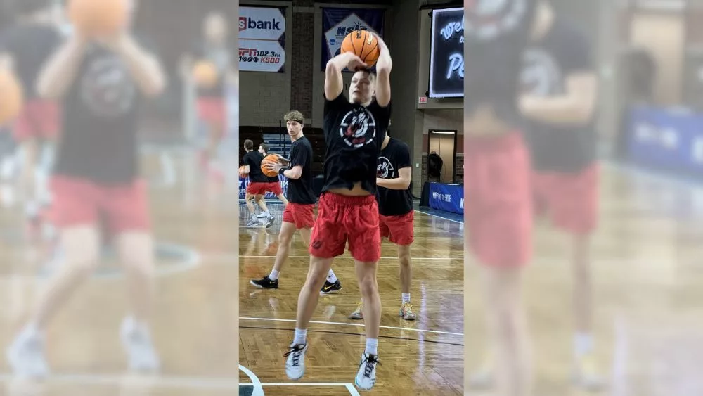 Carson Johnson shooting a basketball