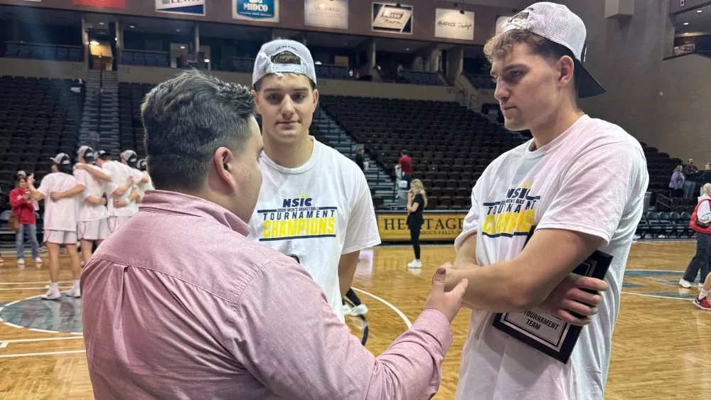 3 guys having a conversation