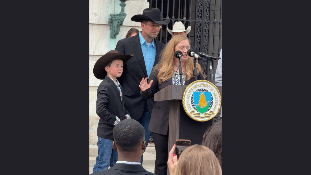 Image of the Maude family speaking during a press conference in Washington D.C.