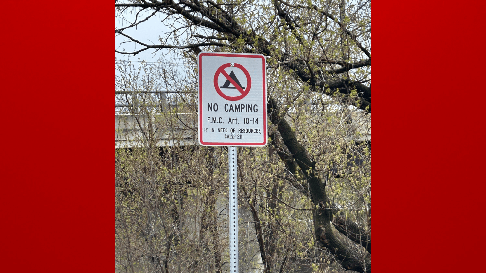 Camping ban sign