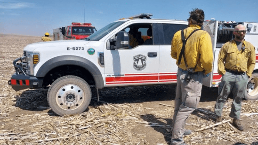 Image of fire crews near a wildfire in Sheridan County