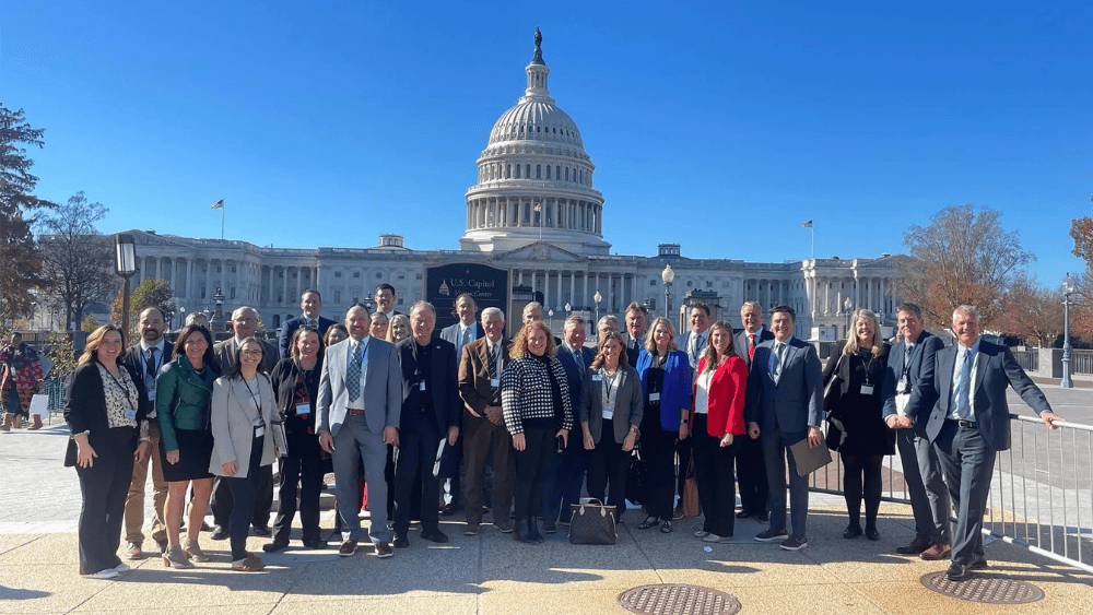 Business leaders pose in Washington^ D.C.^ at the 2023 Fly-In.