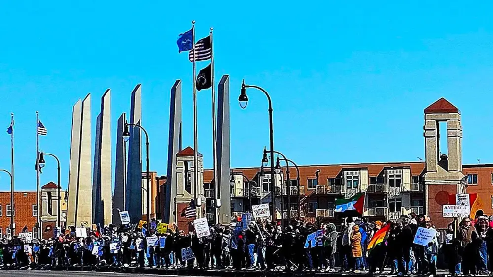 Image of protesters at Fargo's Veterans Memorial Bridge
