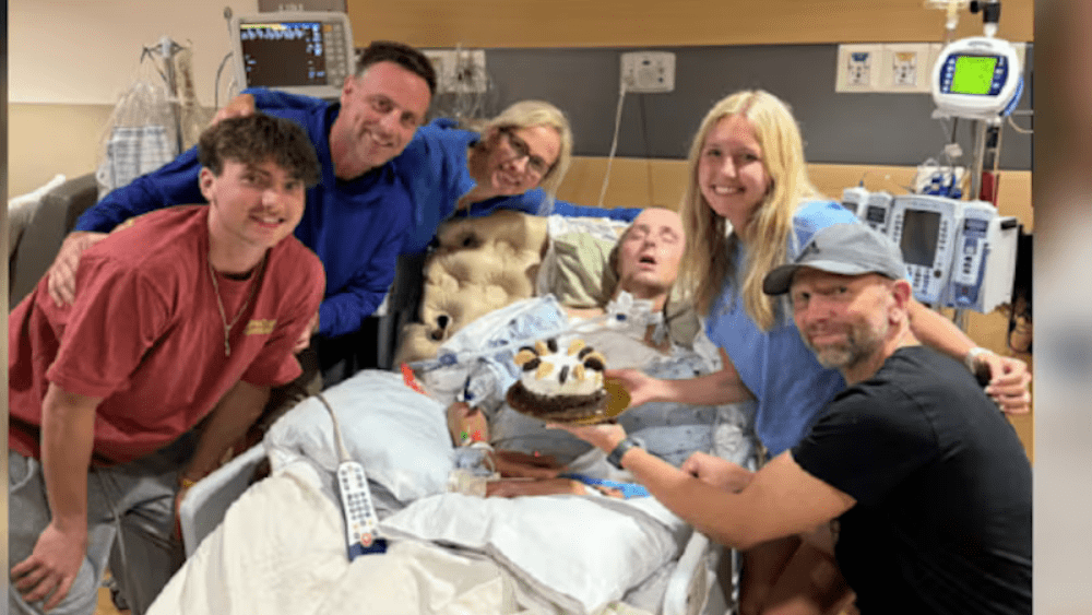 Image of the Meier family at Boden's hospital bedside