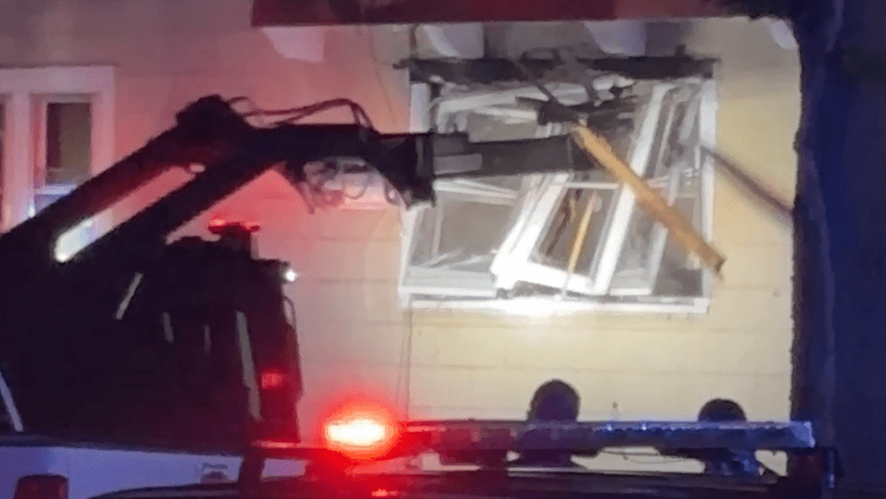 Image of "Rook" used by SWAT team to take out side window during attempts to get suspect out of home