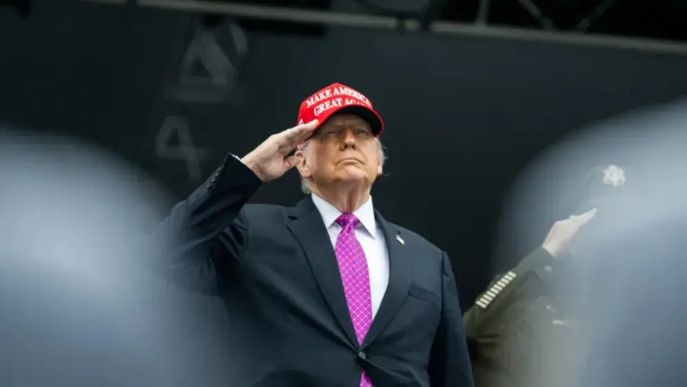 Image of President Trump saluting at the 2025 U.S. Military Academy commencement