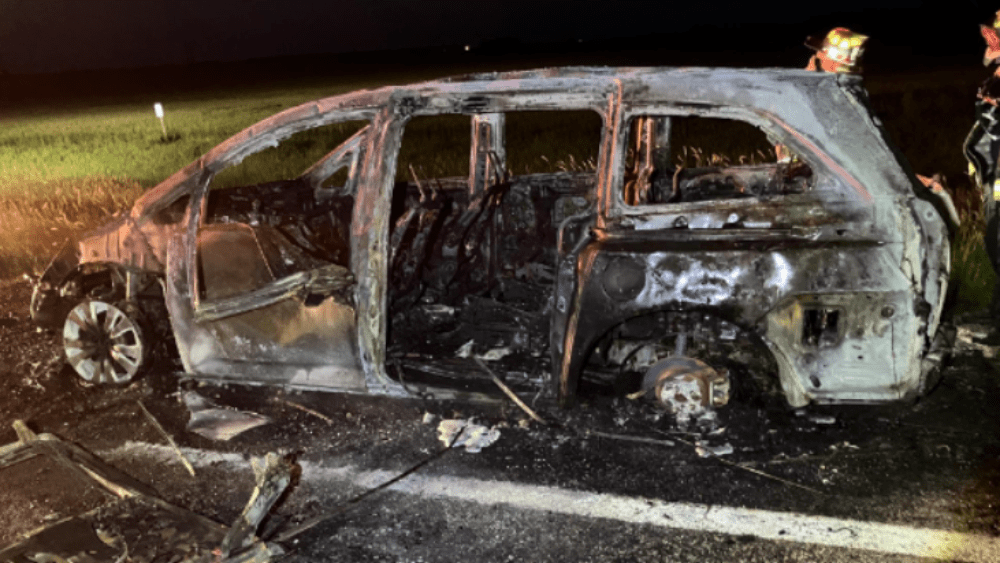 Image of the burned out car after the fire was put out