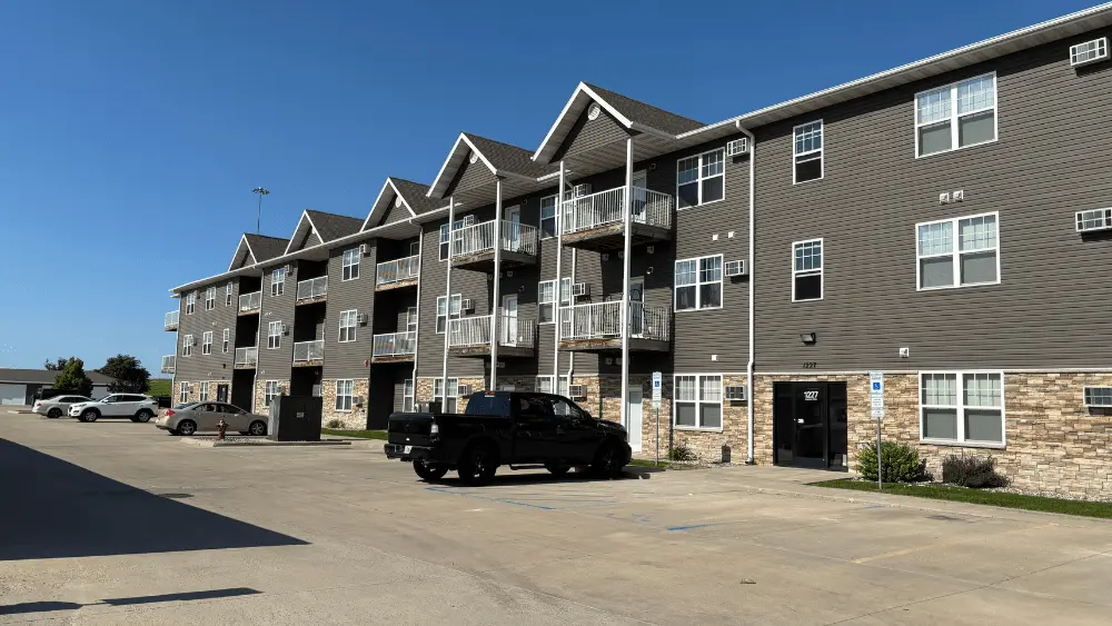 Image of front of Burlington Apartments complex