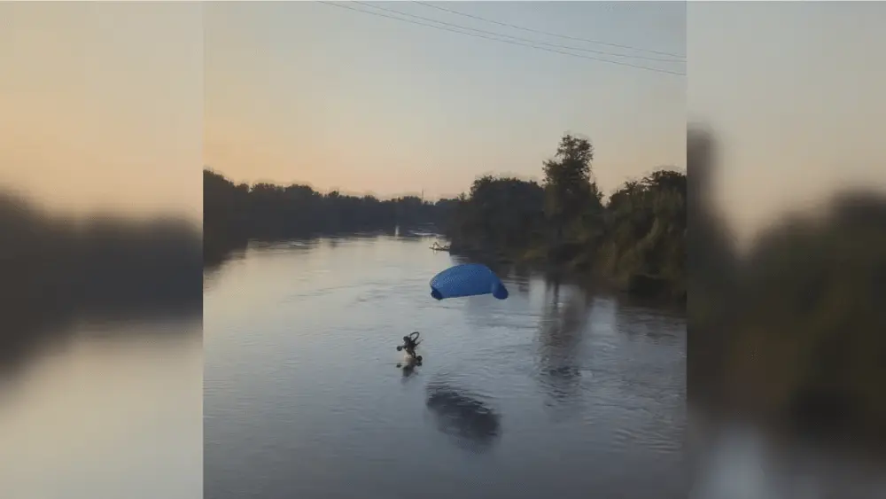 Image of video screenshot of paragliding accident in Grand Forks