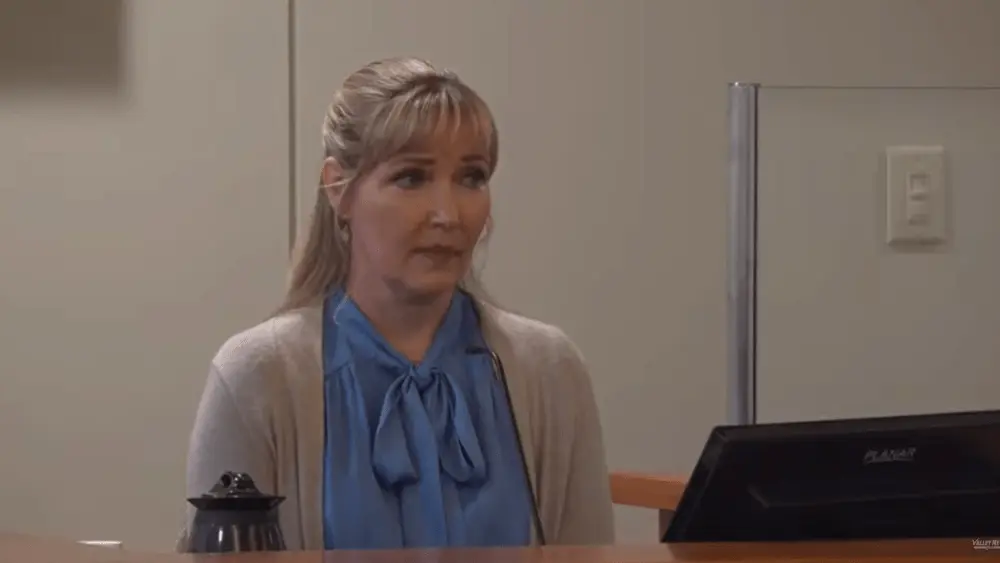 Image of Nicole Mitchell taking the stand at her burglary trial