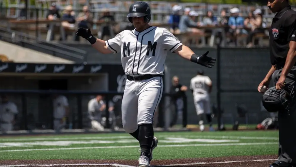Baseball player scoring a run