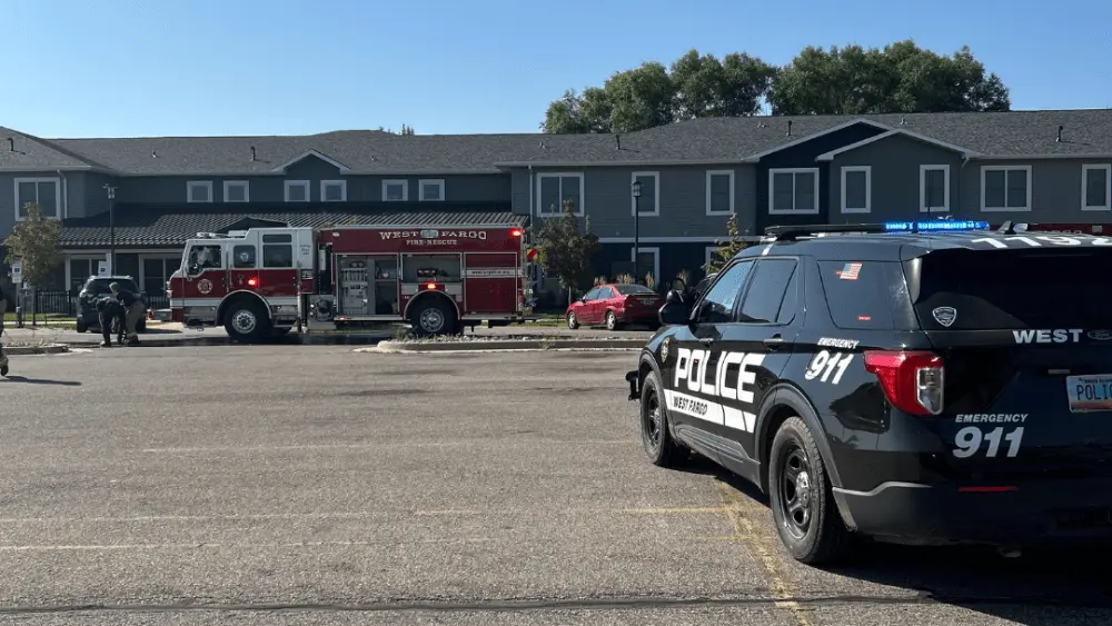 Image of first responders at fire scene in West Fargo