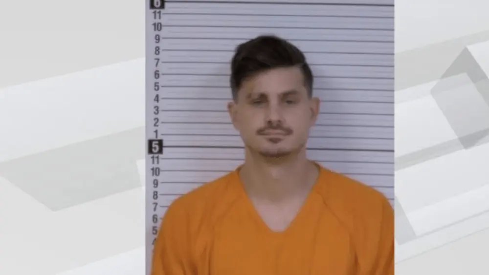man in an orange shirt
