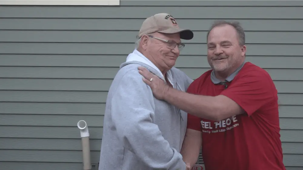 Image of John Nordine congratulated for winning the contest