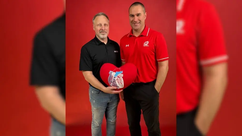 2 guys posing for a photo