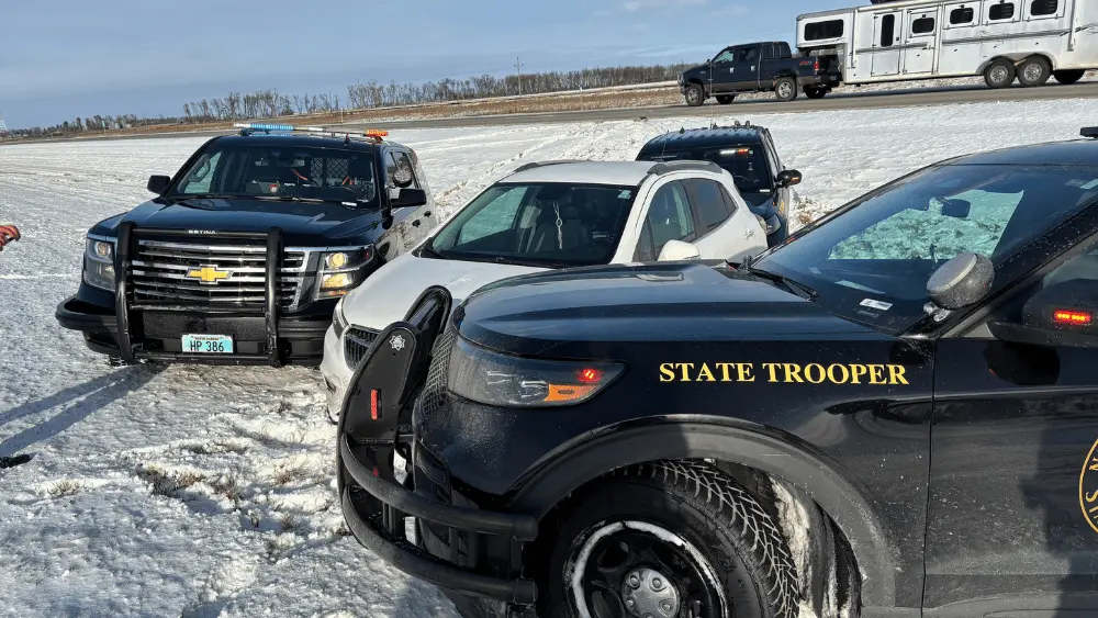 squad cars surround vehicle