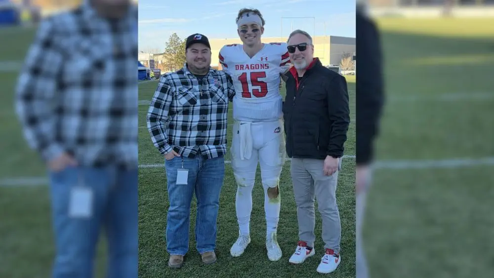3 guys posing for a photo