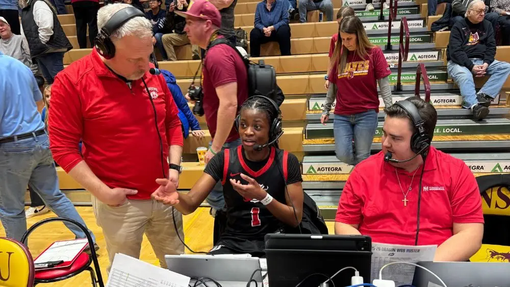 3 people having a conversation