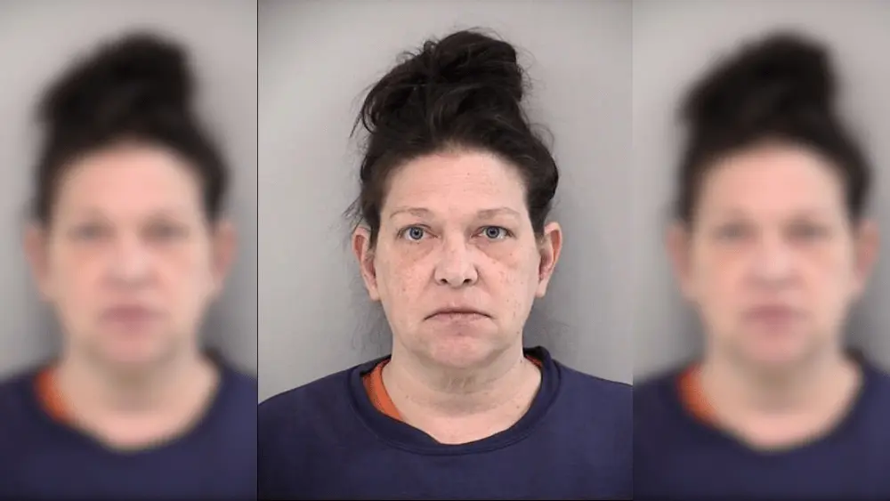 a woman in a mugshot