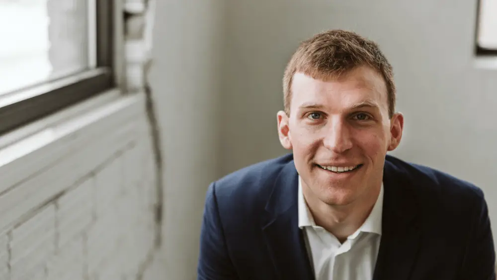 a man seated in a chair