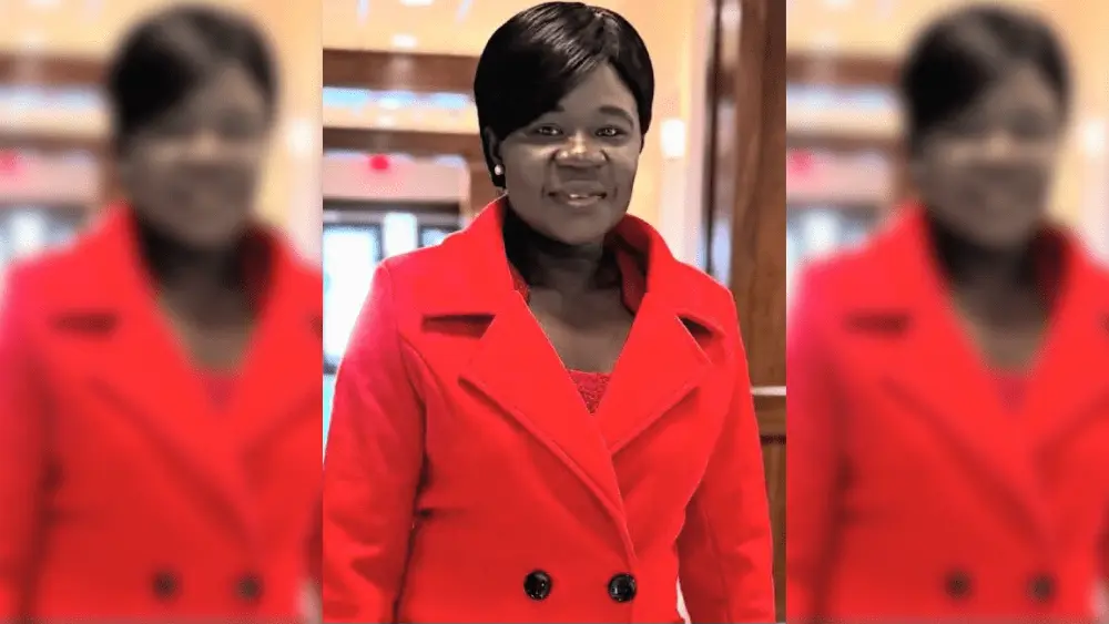 a woman in a red jacket