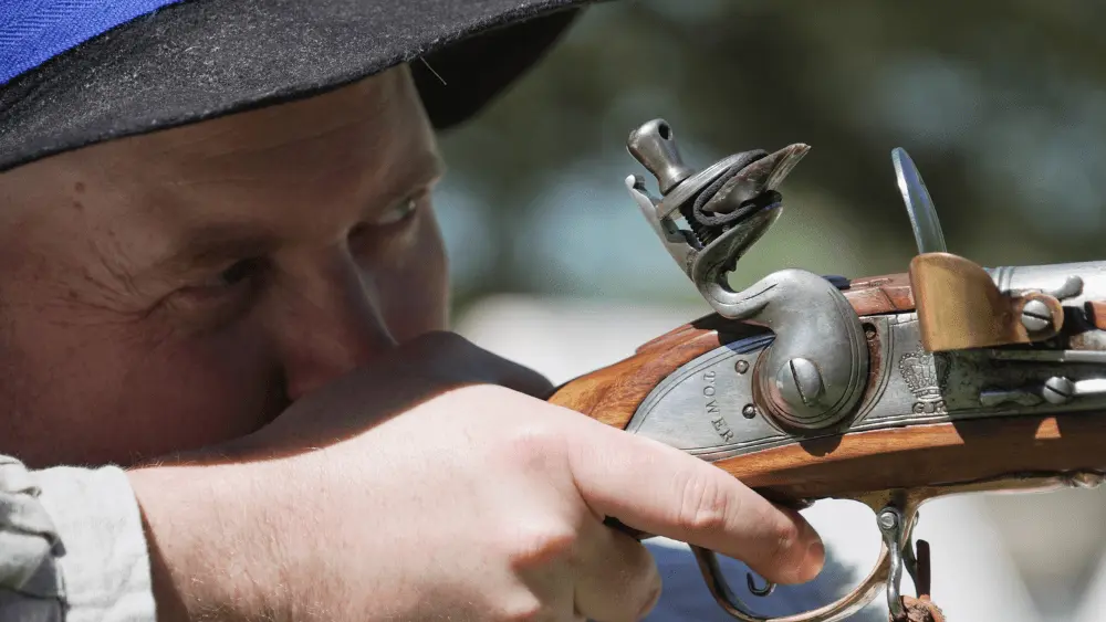 Man shooting a musket