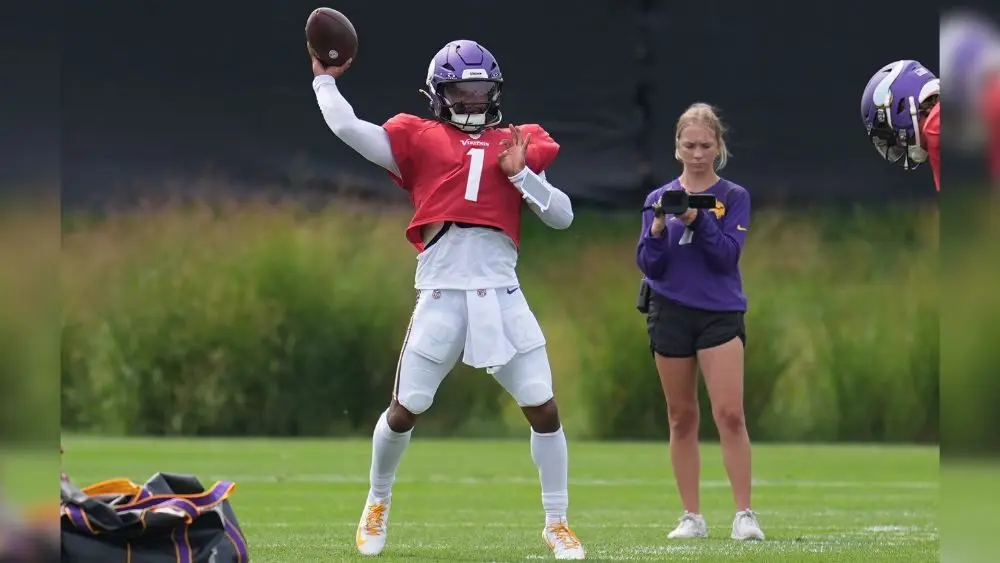 Minnesota Vikings quarterback Kyler Murray looks to throw a pass during the NFL football team's training camp