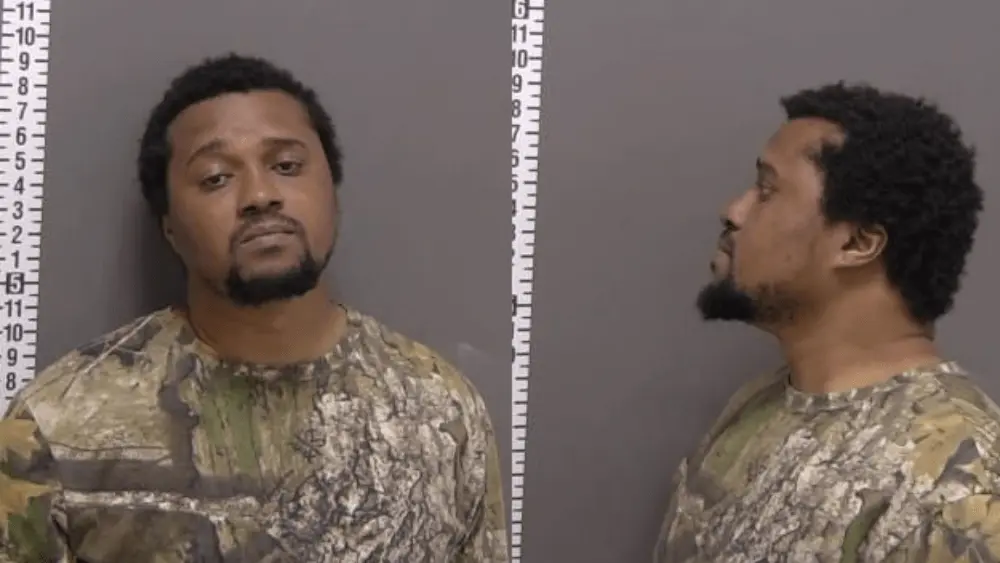 a man in a mugshot