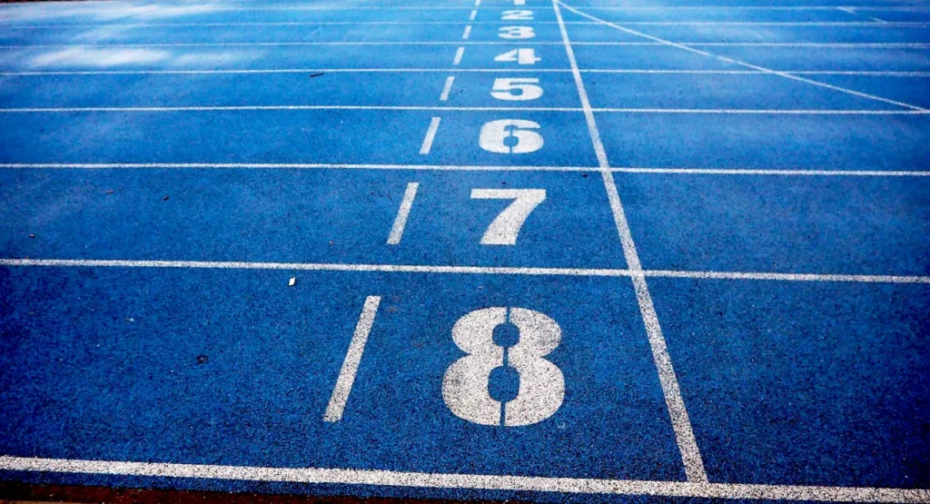 Photo shows running lanes on track.