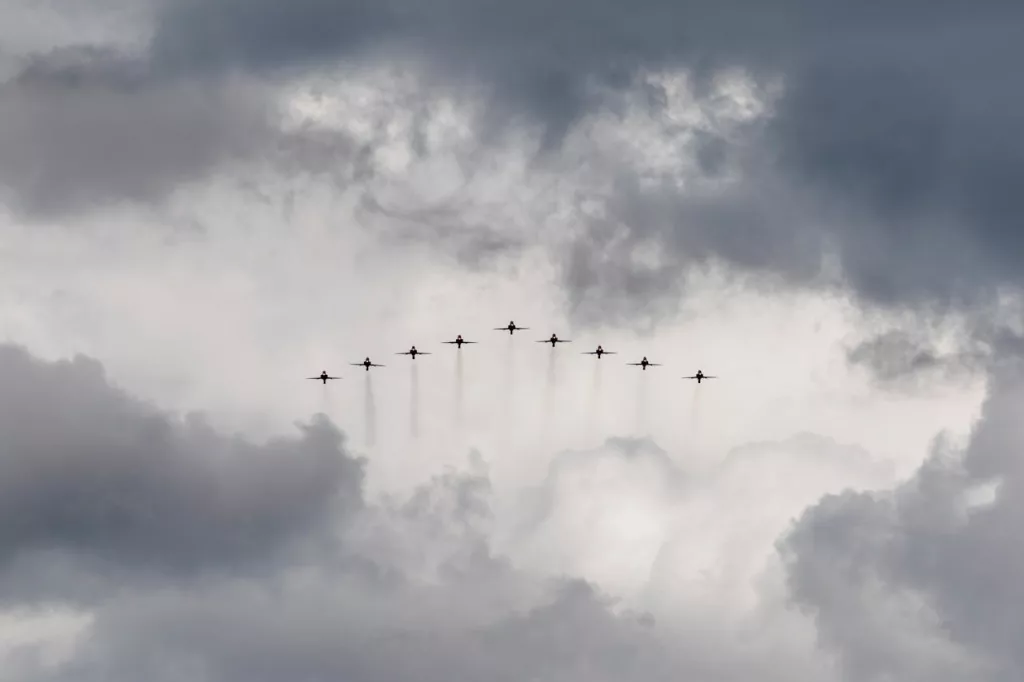 Photo shows jets flying in formation.