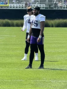 Jabril Cox standing at practice in his Vikings uniform