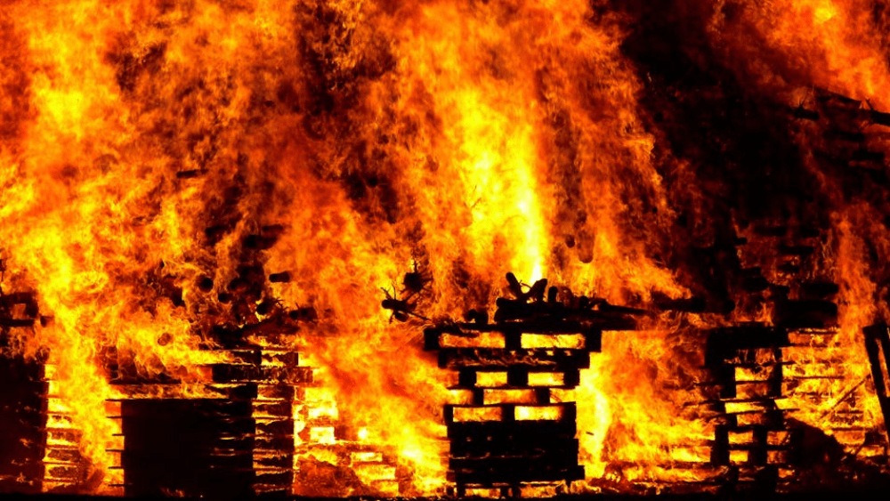 Wildfire burning wooden pallets