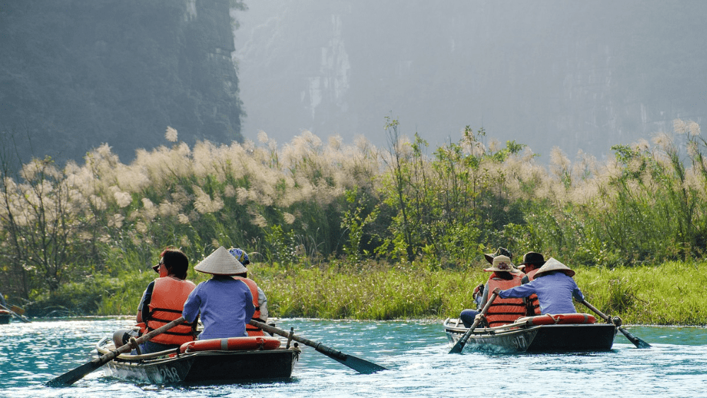 two kayakers on a lake or river