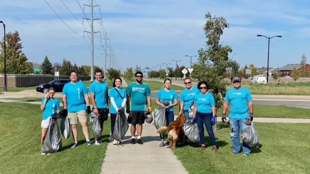 A group of individuals clean up the streets