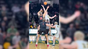 MSUM's Jacob Jennissen and NDSU's Noah Feddersen jumping for a tip off