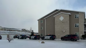 Fargo Police vehicles outside a building