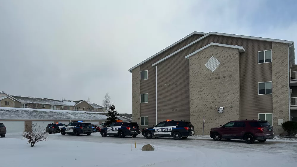 Fargo Police vehicles outside a building