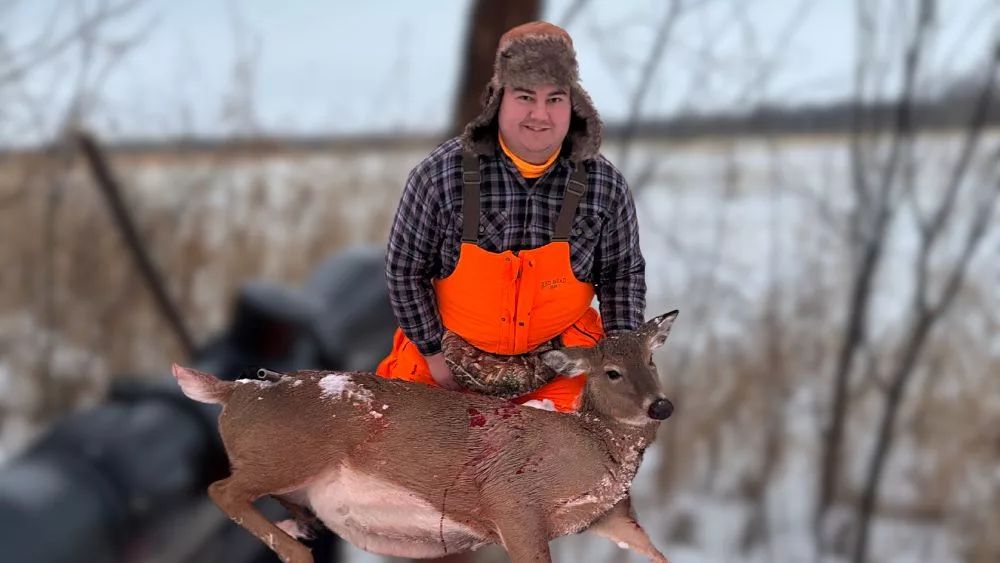 James McCarty with his deer