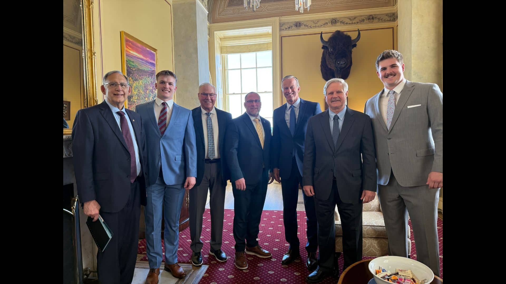 Image of NDSU players with congressional members on Capitol Hill