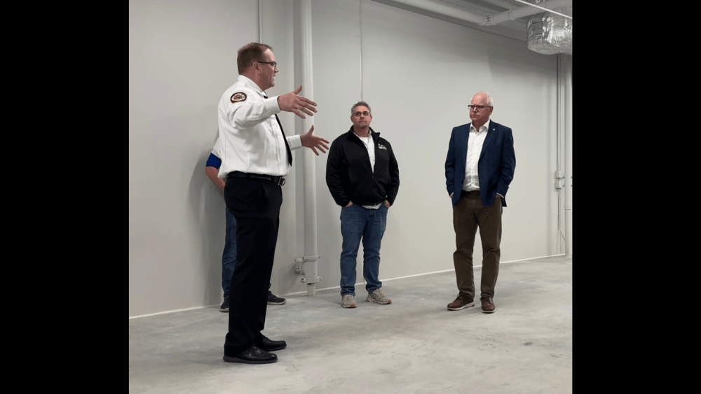 Dilworth Fire Chief Scott Payne give Governor Tim Walz a tour of the new fire station