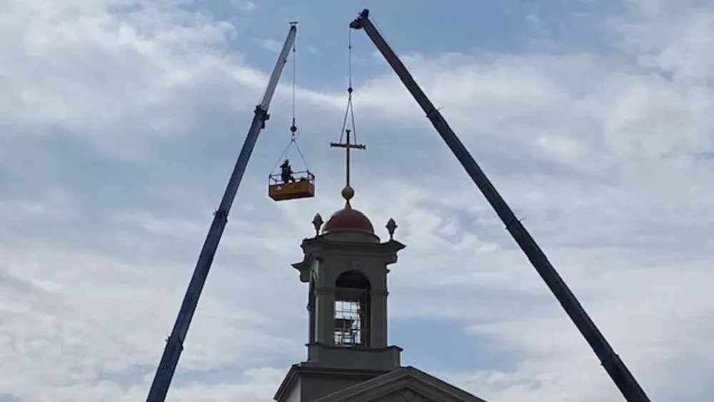 A cross on top of a building
