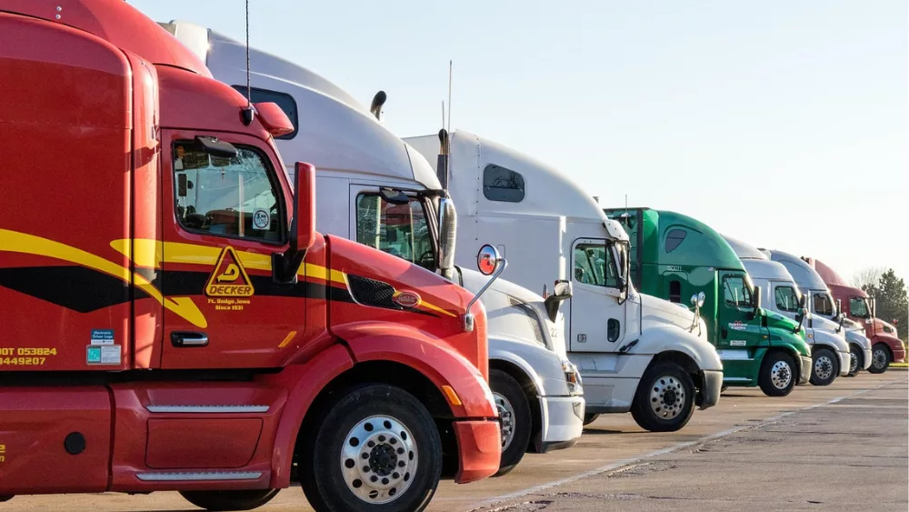 Image of trucks parked at a truck stop