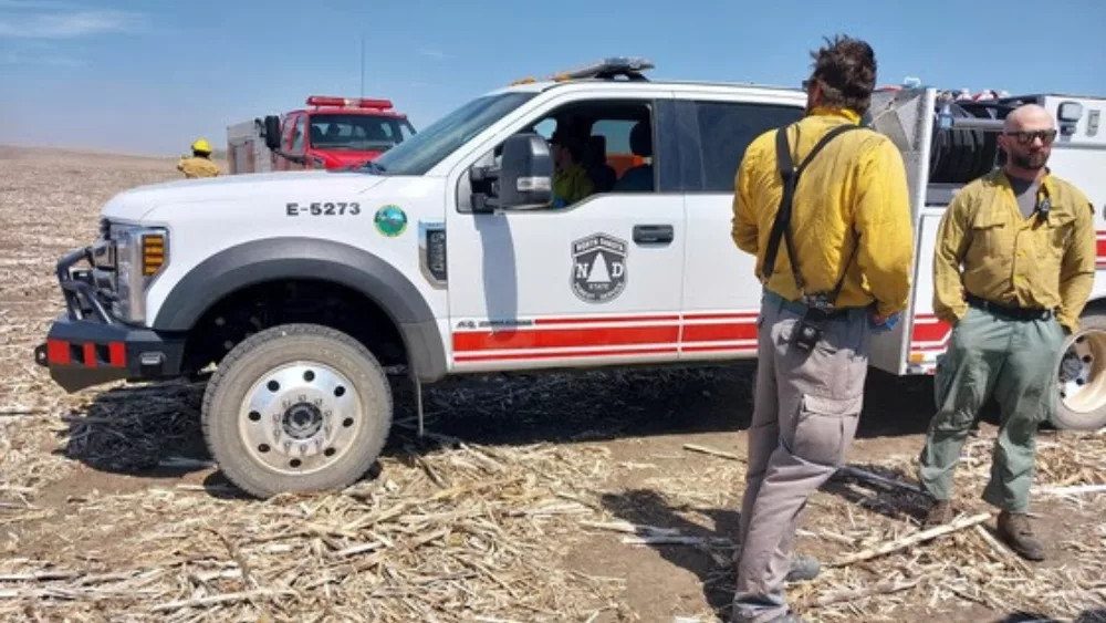 Image of fire crews near a wildfire in Sheridan County