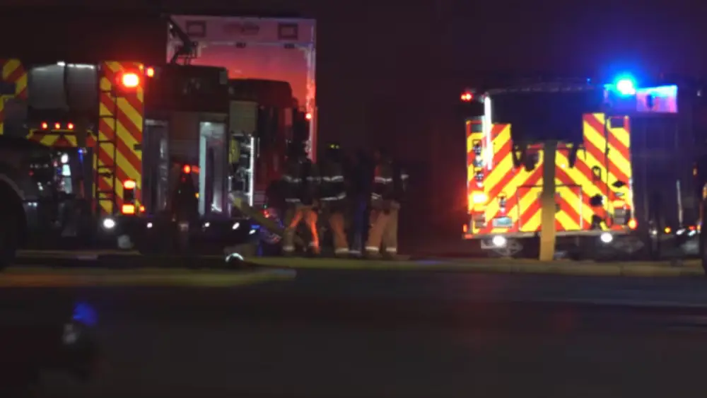 Image of fire trucks at scene on Main Ave in Fargo