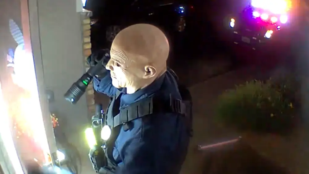 Image of Vance Boetler allegedly in a mask at a lawmaker's front door