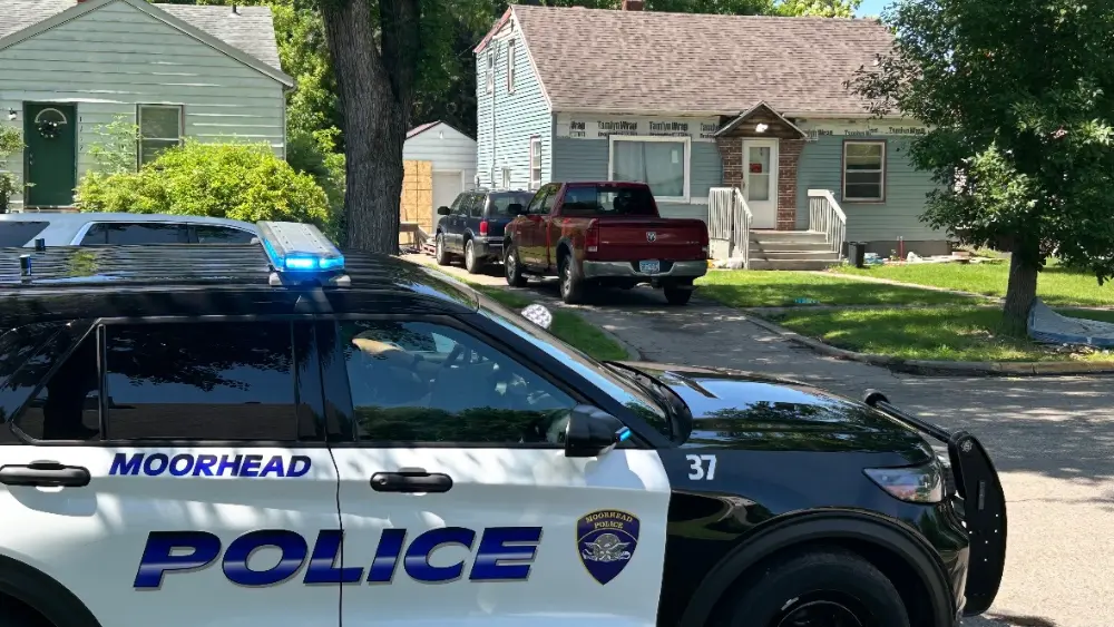 Image of Moorhead police cruiser at the scene of the drive by