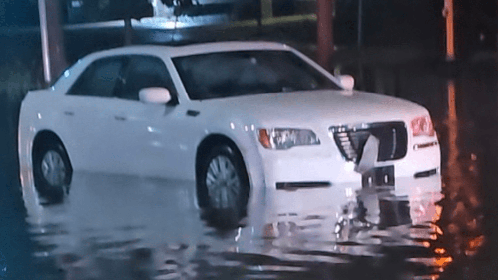Image of Jennifer Jordan's car stuck in floodwater