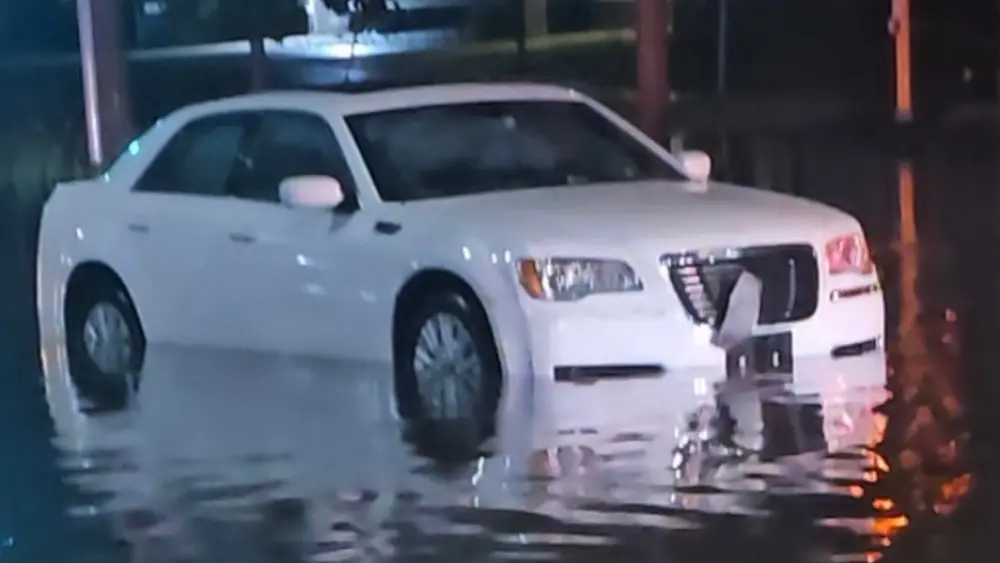 Image of Jennifer Jordan's car stuck in floodwater
